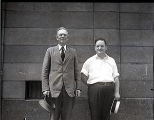 Special Officer Jack Flavin: Flavin, in uniform, standing next to unidentified man