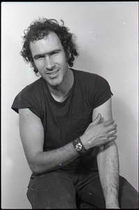 Studio portrait of Richard Safft, seated on a stool