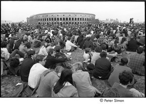 Anti-war rally at Soldier's Field, Harvard University: demonstrators seated by Harvard Stadium