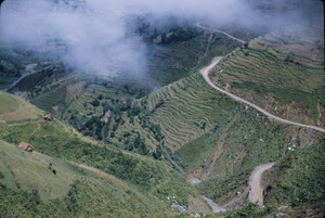 Road winds through farms Kathmandu Valley