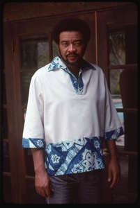 Bill Withers: portrait in front of french doors