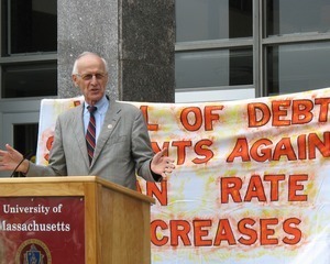 Congressman John W. Olver in front of the UMass Amherst Student Union Building, speaking at a rally against student loan debt