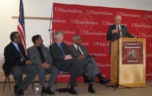 Congressman John W. Olver at the podium at UMass Amherst