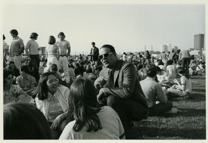 Randolph W. Bromery conversing with students outside at student picnic