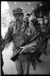 Vietnam Veterans Against the War demonstration 'Search and destroy': veteran with toy M-16, smoking pipe