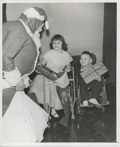 Santa Claus gifting gifts to patients