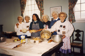 The ECW ladies baking apple pies at All Saints' Episcopal Church