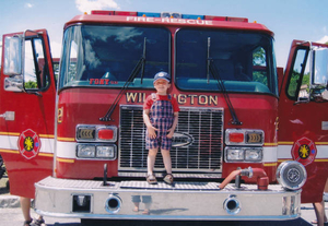Standing on a fire truck