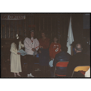 A girl and a boy receiving awards in the MADD 1991 Poster and Essay Contest
