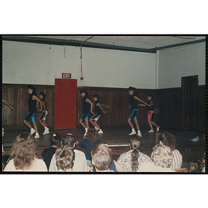 Several girls performing at the Charlestown Boys & Girls Club Talent Show