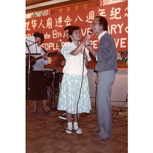 Speakers at a Chinese Progressive Association party