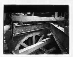 Construction of a tunnel arch showing wood and steel beams and brickwork