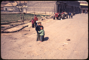 Children in road, tractor