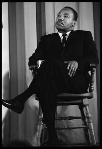 Martin Luther King, Jr., waiting to speak at the Youth, Non-Violence, and Social Change conference, Howard University