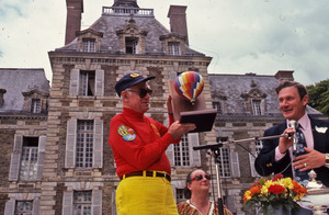 Malcolm Forbes holding a trophy