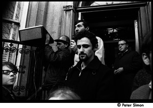 Howard Zinn at the entrance to the University Placement Office, Boston University, addressing protesters demonstrating on-campus recruiting by Dow Chemical Co.