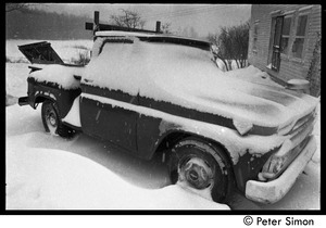 Pickup truck buried in snow during a winter storm, Packer Corners commune