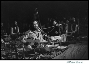 Krishna Das (guitar) onstage with Amazing Grace in the Winterland Ballroom during the Ram Dass 'marathon'