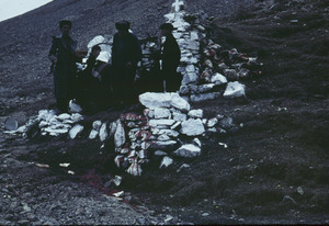Men at the place of sheep sacrifice