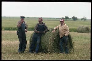 Talk of the morning: three Kansas farmers took some time off from loading alfalfa bales to talk about crops and weather