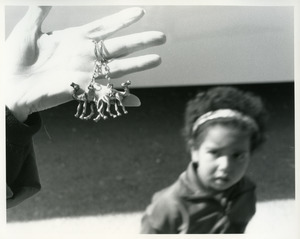 Child looking at trinkets