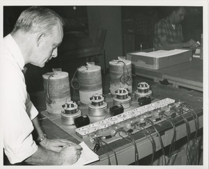 Man inspecting motor function