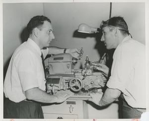 Two men in machine shop