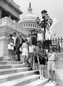 Congressman John W. Olver (3d from left) with group of visitors, posed on the steps of the United States Capitol building