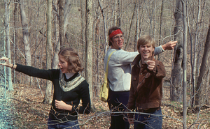 Students estimating basal area using prisms near the sugarbush.