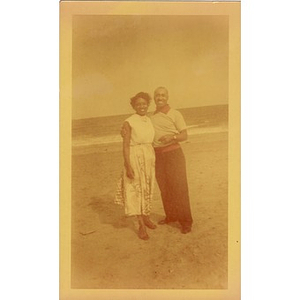 Inez Irving and Laymon Hunter pose on the beach