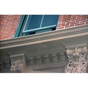 Details of the carved molding above the front door to Residencia Betances.