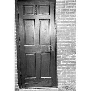 Door with house number "624."