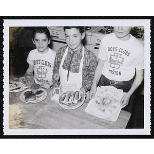 Members of the Tom Pappas Chefs' Club display their prize winning dishes