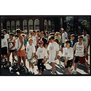 Children and teenagers wait at the start line of the Battle of Bunker Hill Road Race