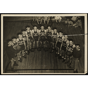 The Boys' Club Boston basketball team poses for a bird's-eye group shot