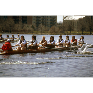 Women's crew team rowing in the Charles River