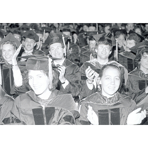 Students clapping at the School of Law commencement ceremony for the Class of 1987