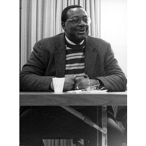 Joseph Warren seated at a meeting
