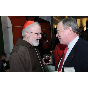 Cardinal O'Malley laughing with Jack McCarthy