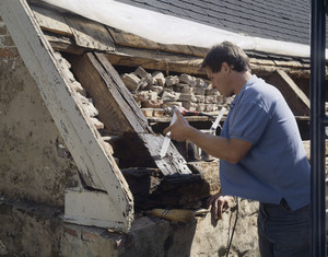 Working on the roof, Spencer-Peirce-Little Farm, Newbury, Mass.