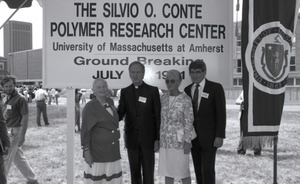 Corinne Conte with priest and two other unidentified people
