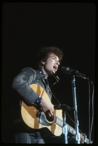 Bob Dylan performing on stage