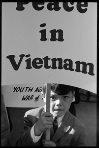 Child holding a sign 'Peace in Vietnam': Washington Vietnam March for Peace