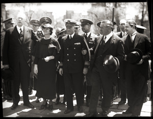 Welcome home ceremony for Richard Byrd at the Massachusetts State House following his Antarctic Expedition: Admiral Byrd, arm in arm with Gov. James Michael Curley