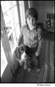 Young boy with a spaniel