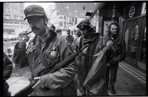 Vietnam Veterans Against the War demonstration 'Search and destroy': veteran with toy M-16, smoking pipe