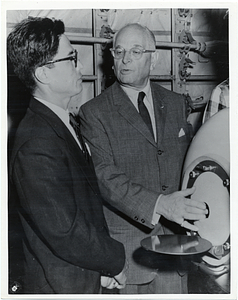 Mark Bortman with an unidentified man and an iron lung