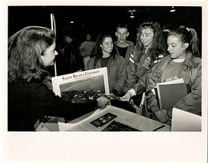 Salve Regina University table at Lowell High School College Fair