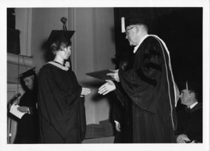 Patricia Boynton receiving degree from Dean Donald W. Goodrich (CAS) at the 1969 Suffolk University commencement