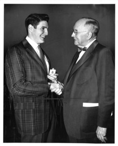 Suffolk University student Alan Chapman and President Dennis C. Haley (1960-1965) at the 1961 Recognition Day